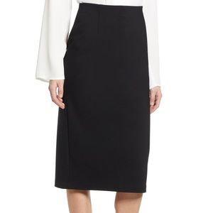 Black suiting pencil skirt, below the knee